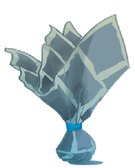 Imagem: Ilustração. Peteca de papel com uma fita.  Fim da imagem.