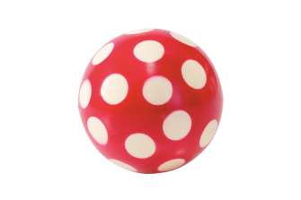 Imagem: Fotografia. Uma bola vermelha com bolas brancas. Fim da imagem.