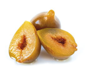 Imagem: Fotografia. Uma fruta de aspecto úmido e amarelado dividido ao meio.   Fim da imagem.