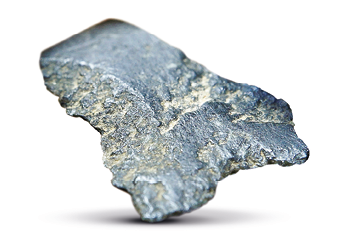 Imagem: Fotografia. Pedra sem forma característica e de superfície lisa com fissuras. Fim da imagem.